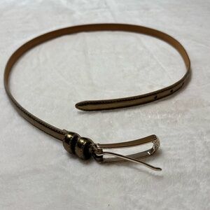 Brighton Sz 32 Women’s 1/2” Belt. Bronze hue w/ gold tone decorative buckle